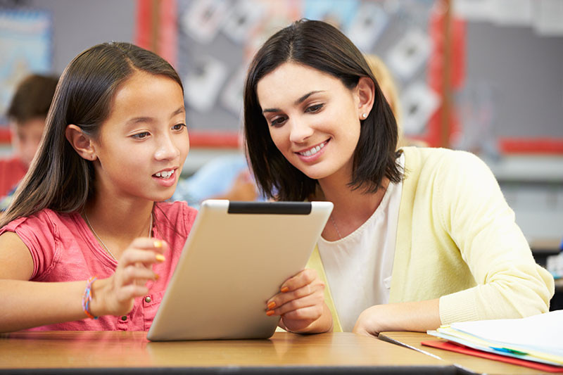 Young girl with teacher